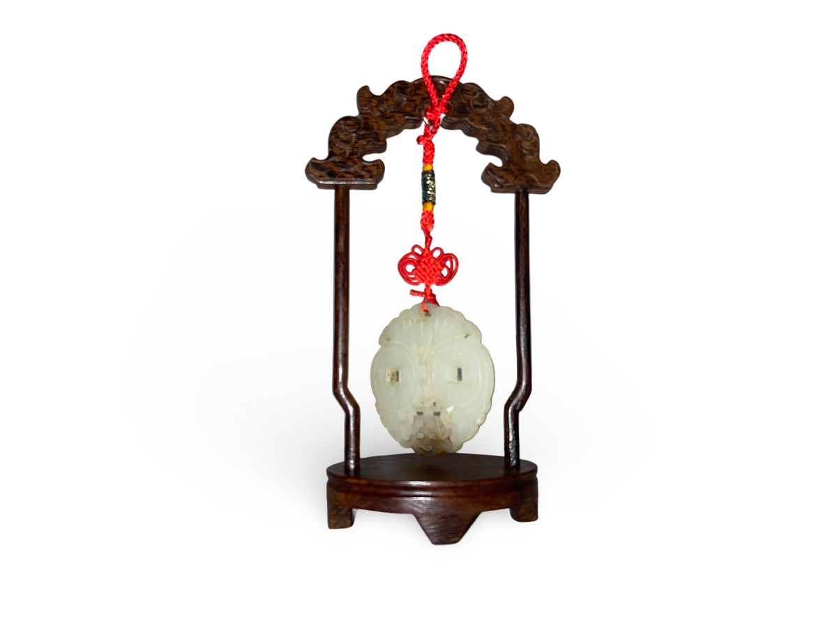 Jade Pendant with Twin Coin Motifs