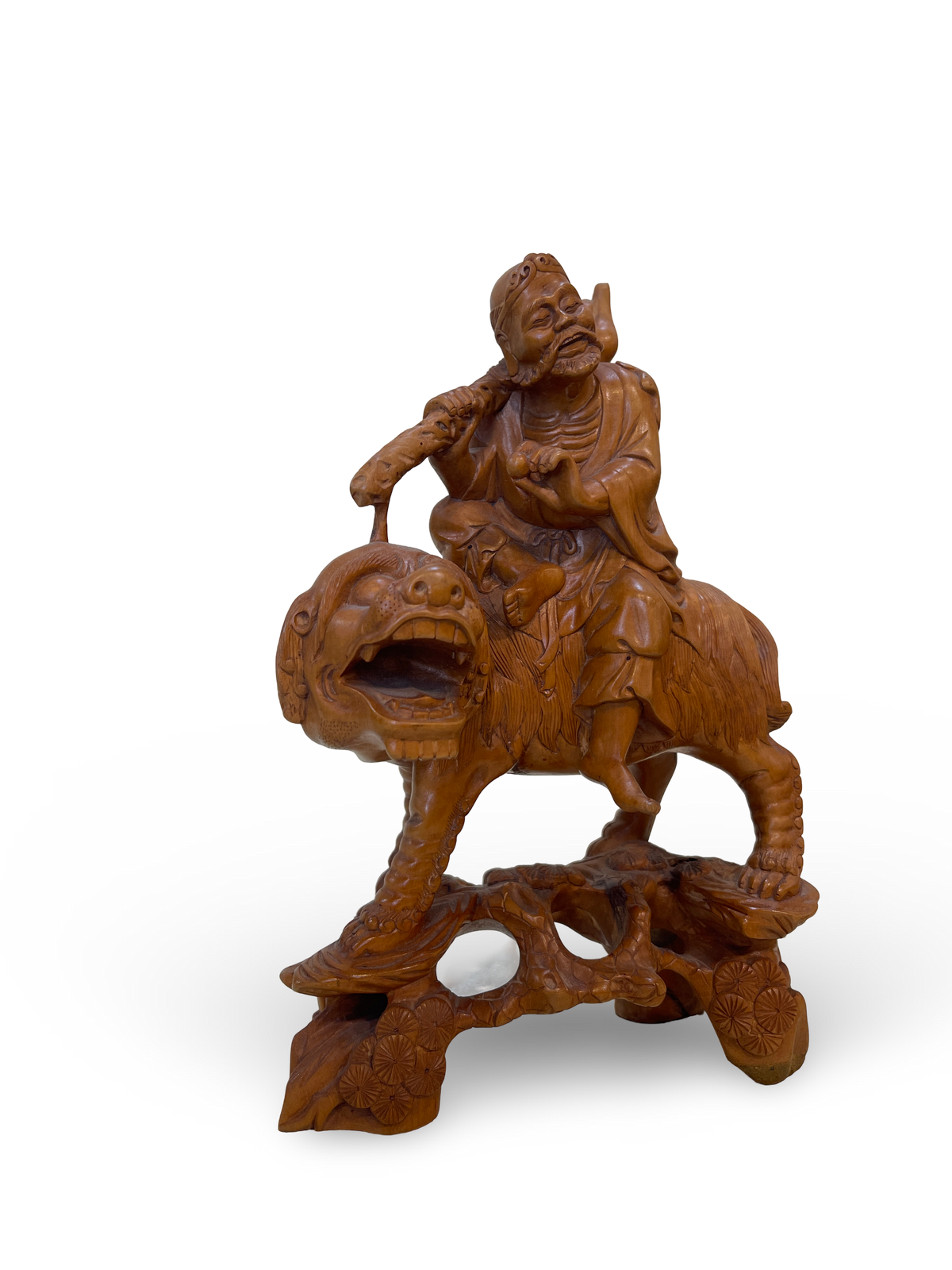 Carved Wooden Figure of an Elder on Mythical Beast