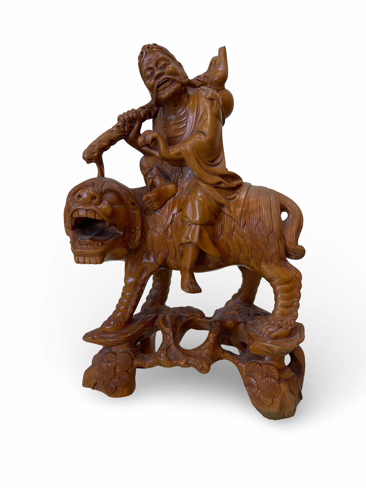 Carved Wooden Figure of an Elder on Mythical Beast
