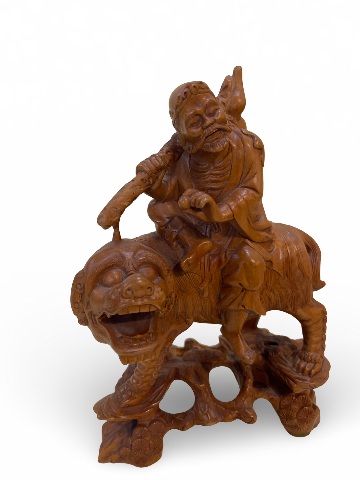 Carved Wooden Figure of an Elder on Mythical Beast