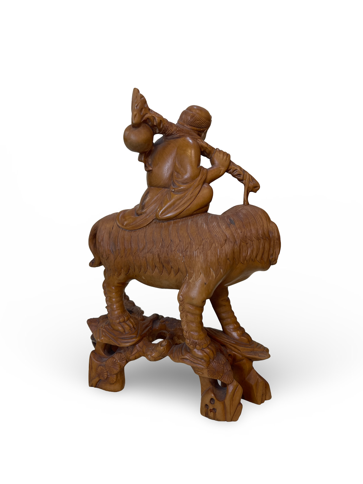 Carved Wooden Figure of an Elder on Mythical Beast