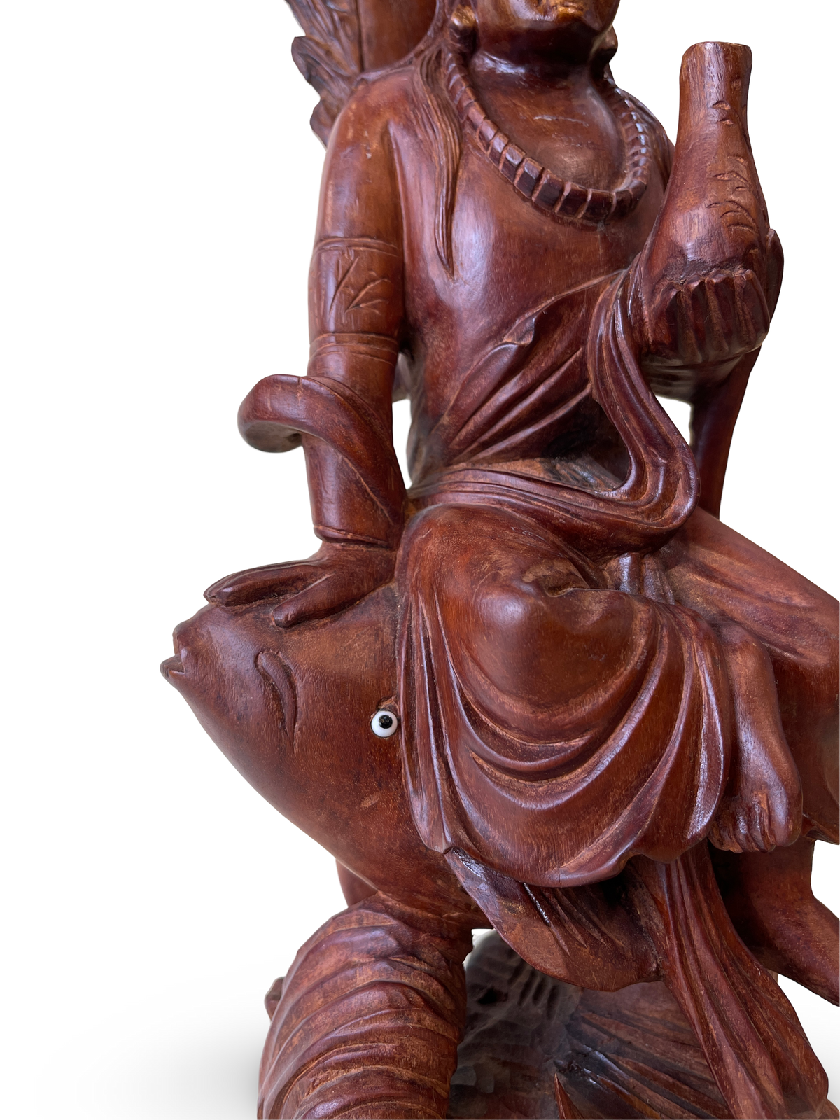 Carved Wooden Figure of a Deity Riding a Fish