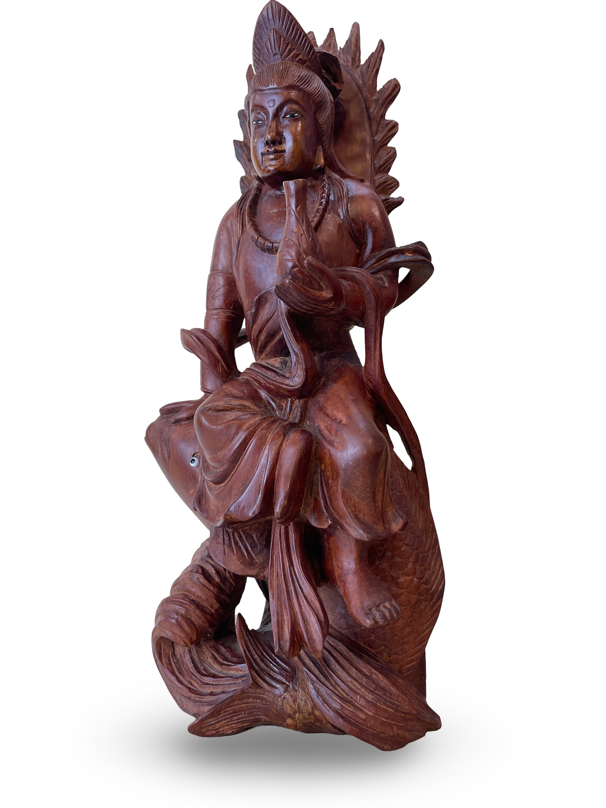 Carved Wooden Figure of a Deity Riding a Fish