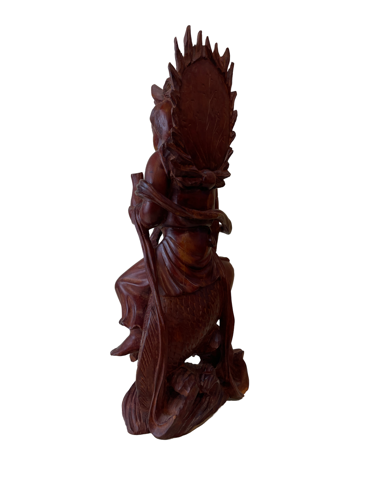 Carved Wooden Figure of a Deity Riding a Fish