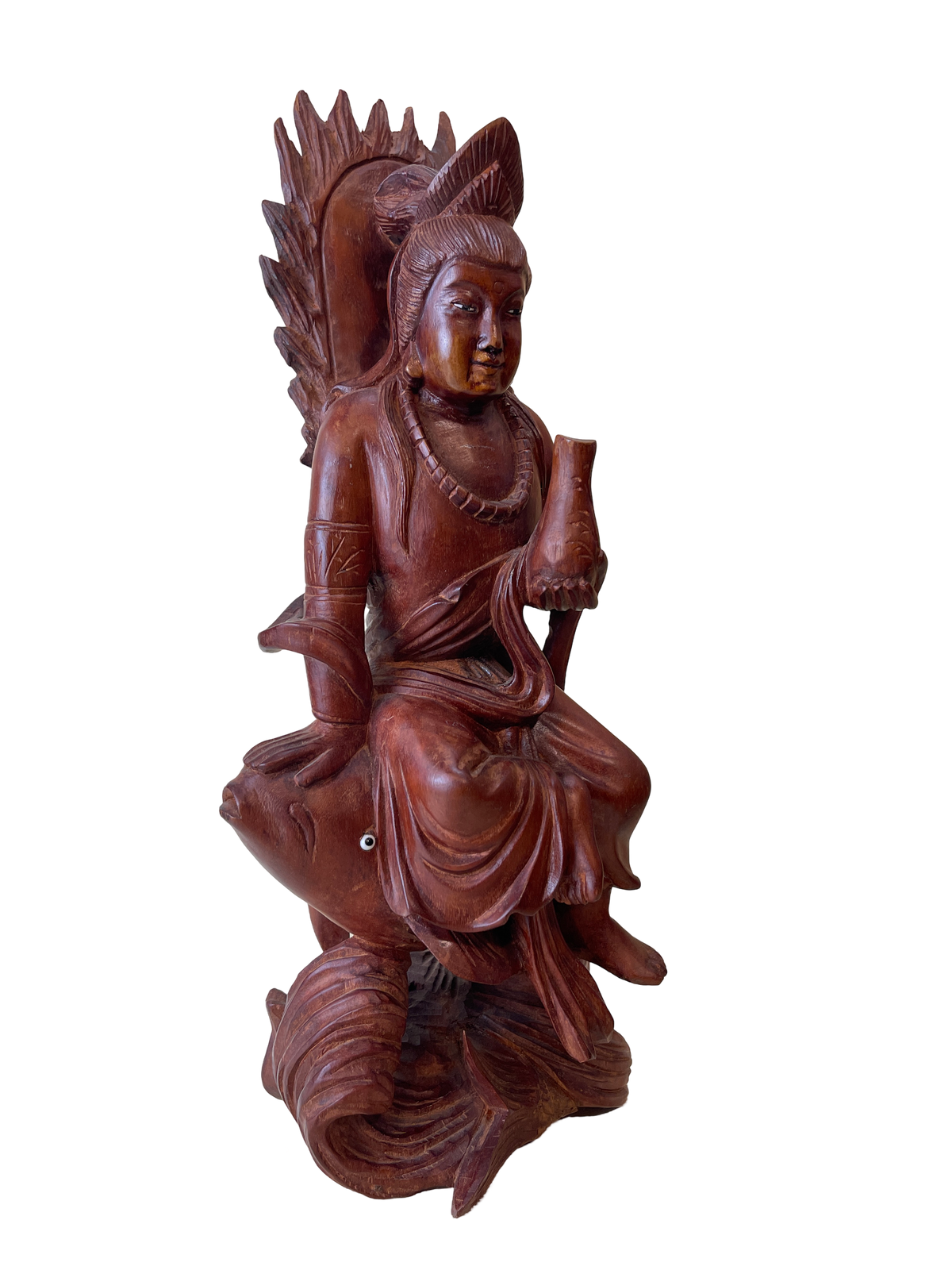 Carved Wooden Figure of a Deity Riding a Fish
