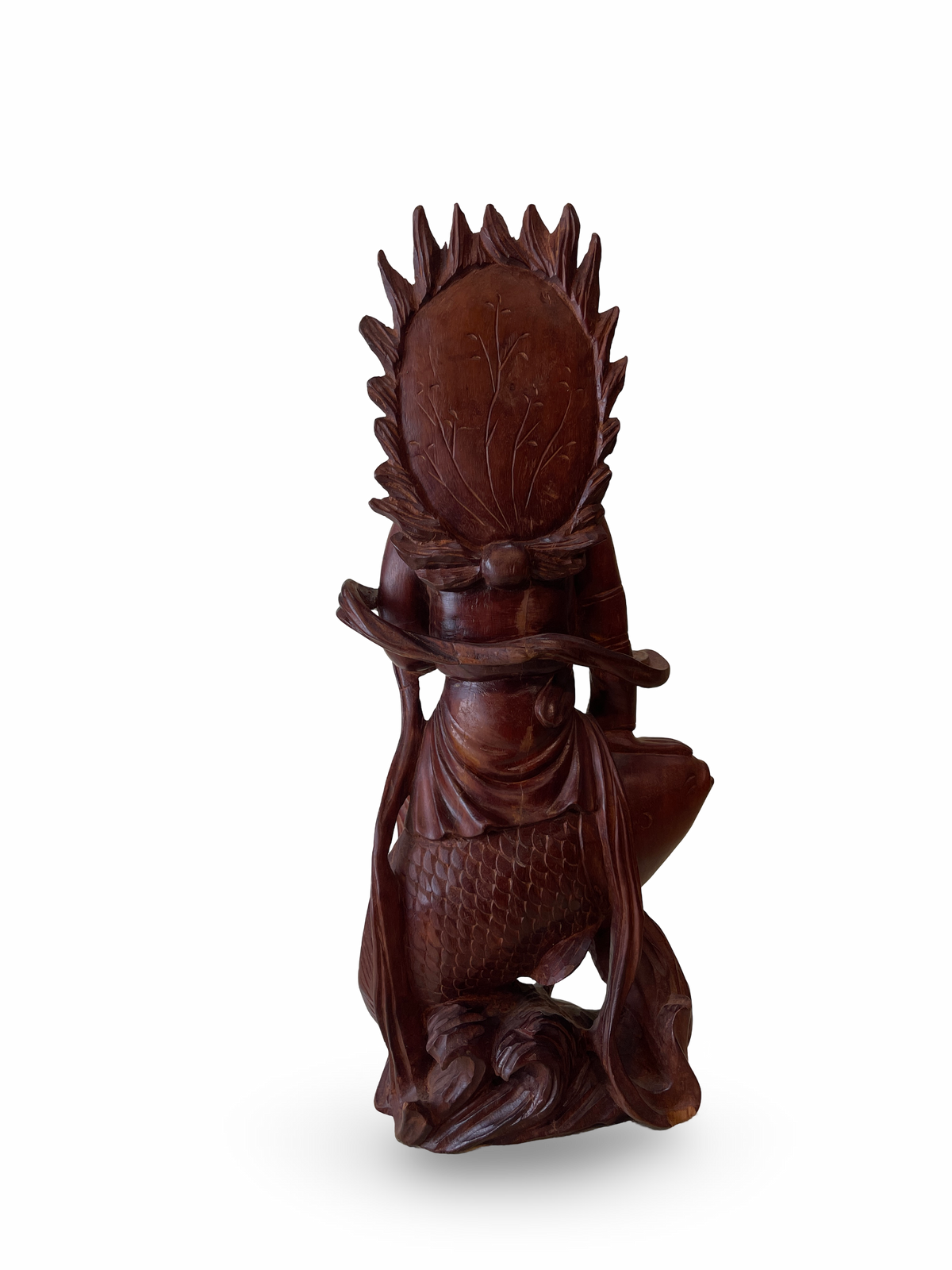 Carved Wooden Figure of a Deity Riding a Fish